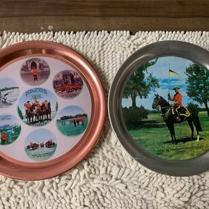 Two vintage RCMP tin plates